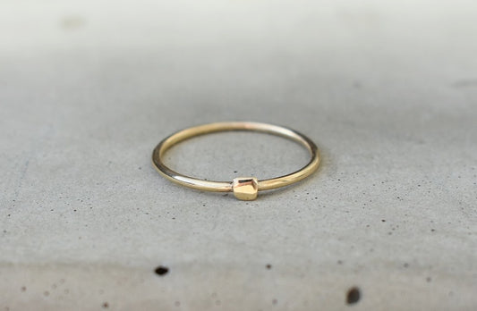 Skinny solid gold ring with little nugget of gold, handmade in Ireland