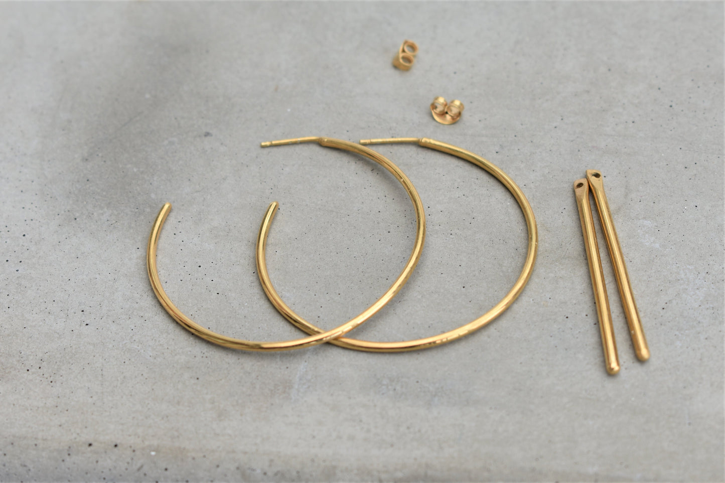 The Most Unlikely Places Small Jacket Hoops in Gold